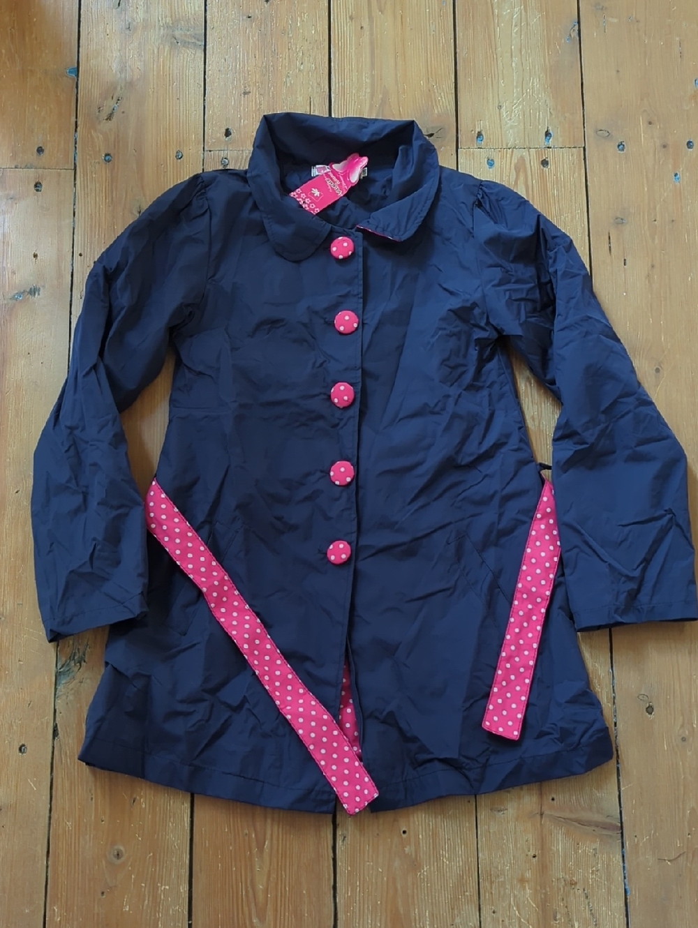 263-Girls' Navy Coat with Pink Polka Dot Trim